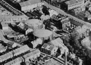 Photograph of an aerial view of the gasworks site taken in August 1958