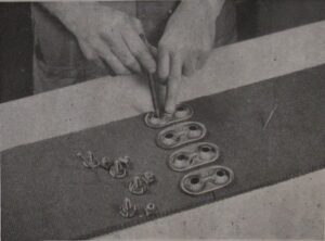 Photograph of instructions for fixing belt fasteners - step 2
