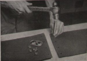 Photograph of instructions for fixing belt fasteners - step 4