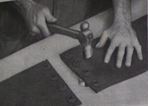 Photograph of instructions for fixing belt fasteners - step 5