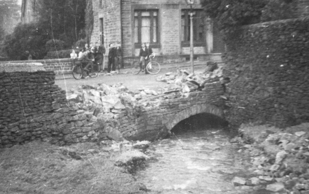 Photograph of a damaged bridge at Old Glossop in 1944 floods