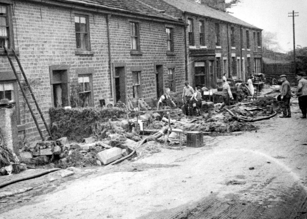 Photograph of flood damaged houses in Charlestown 1944