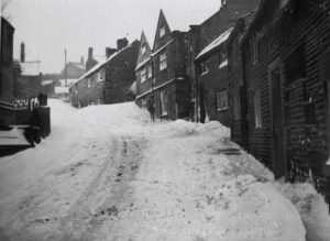 Photograph of Church Street Old Glossop in snow in 1940