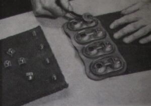 Photograph of instructions for fixing belt fasteners - step 6