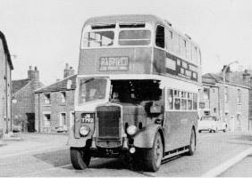 Photograph of a double decker bus on High Street East in 1950s