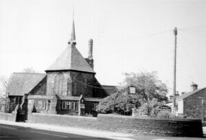 Photograph of St Andrews Church, Hadfield and the Memorial Clock
