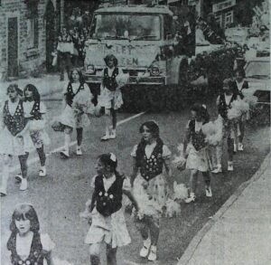 Photograph of procession down Victoria Street, 1977