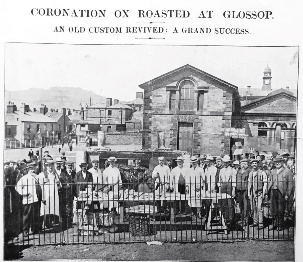 Photograph of the Coronation Ox being roasted on the Market Ground, Glossop