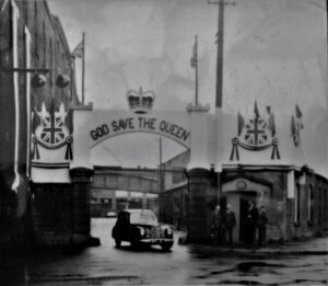 Photograph of the entrance to the CPA works at Dinting for the Coronation 1953