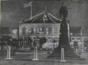 Photograph of floodlit Glossop Town Hall 1953