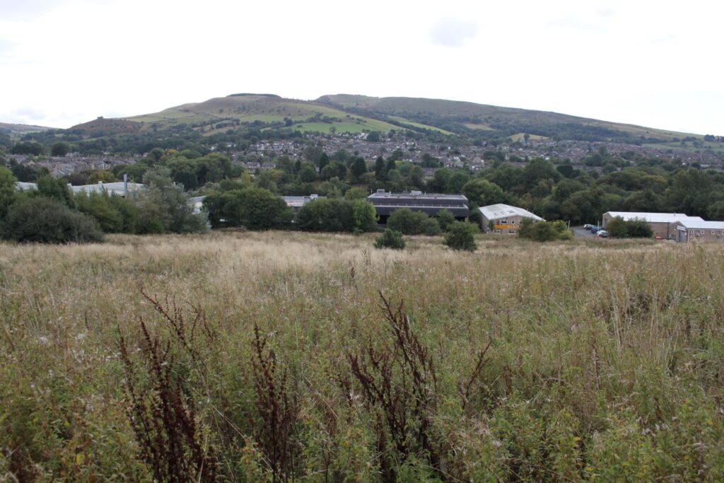Photograph of Simmondley and the Nab looking from Dinting