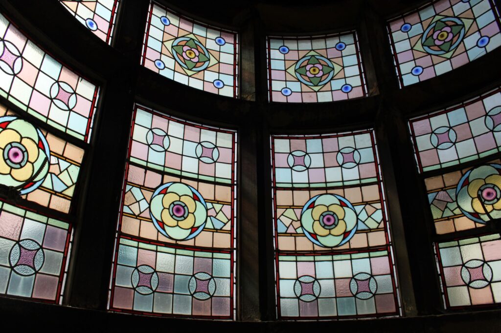 Photograph of a stained glass window in Wood's Hospital, Glossop