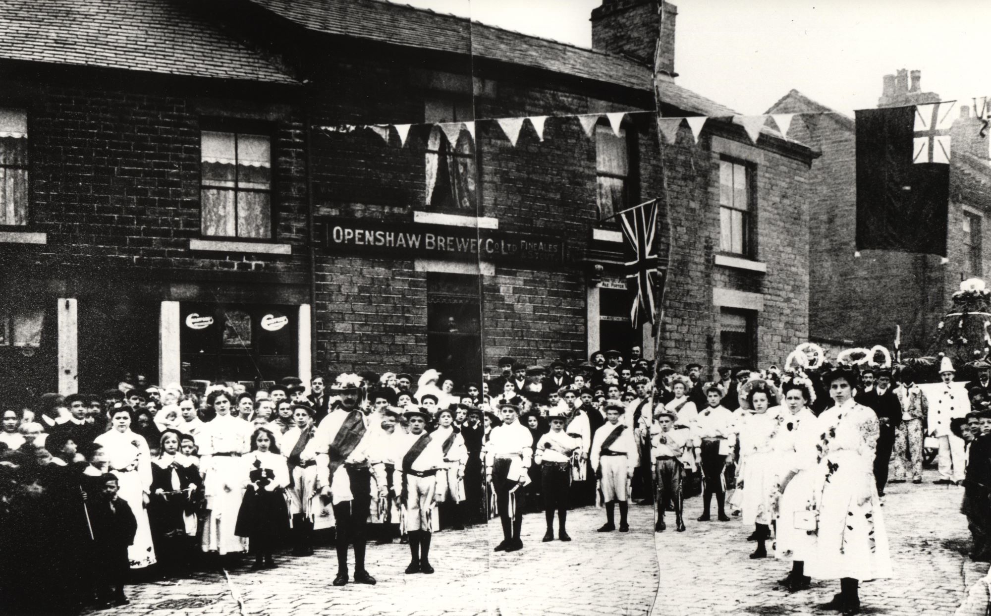 Photograph of a group outside the Roebuck, Whitfield Cross, Whitfield