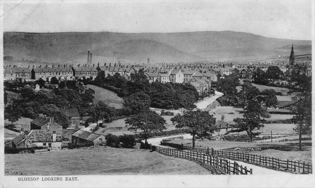 Black and white postcard with a view of Slatelands Road, Glossop