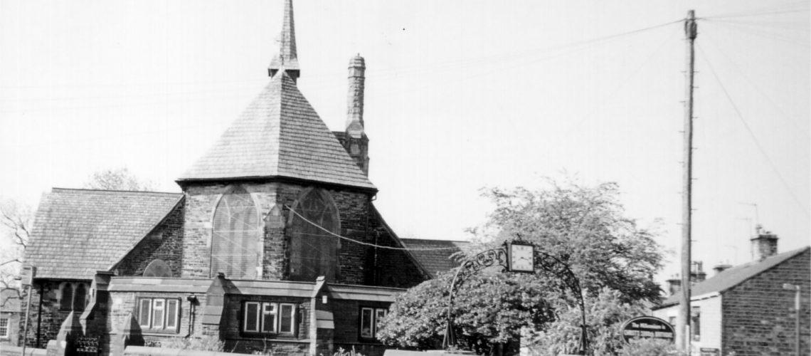 Photograph of St Andrews Church, Hadfield and the Memorial Clock